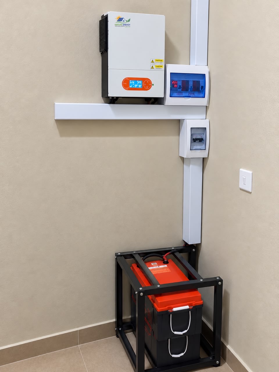 Battery bank and hybrid inverter installed together in a ventilated equipment frame